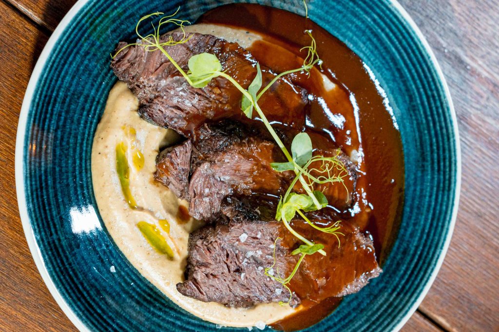 A picture of the beef cheeks from the aragma menu.