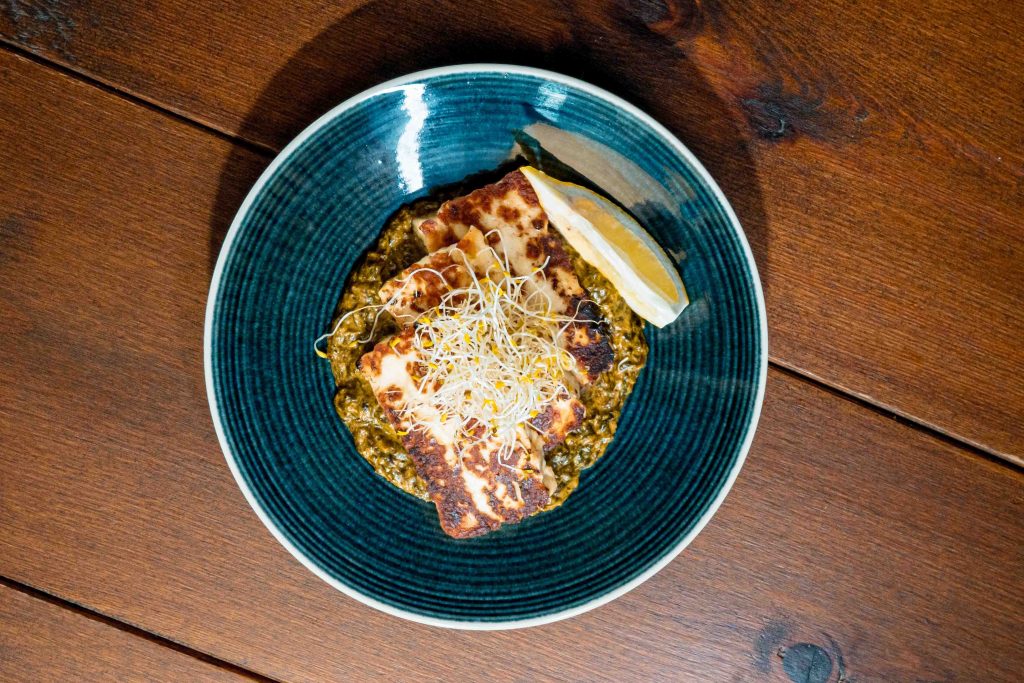Grilled Halloumi with spiced spinach puree.